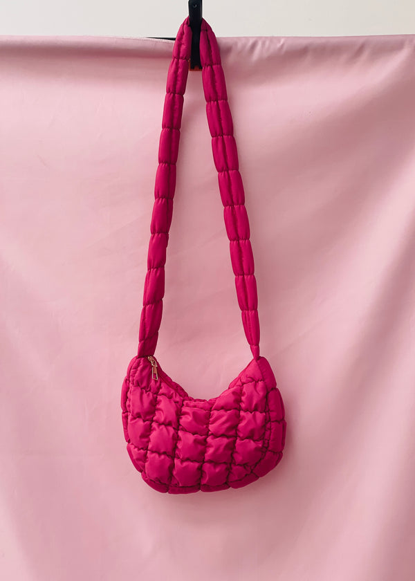 Pink quilted cloud cross body bag